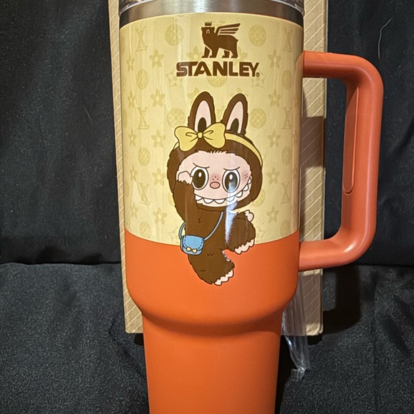 New Stanley 40oz Orange and Cream Travel Mug with Adorable Monster Character - Picture 2 of 7